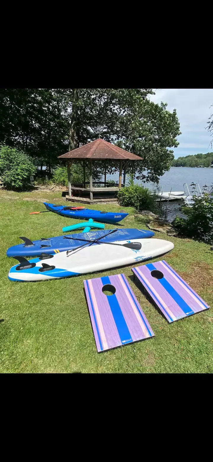 Private dock with kayaks and paddleboards