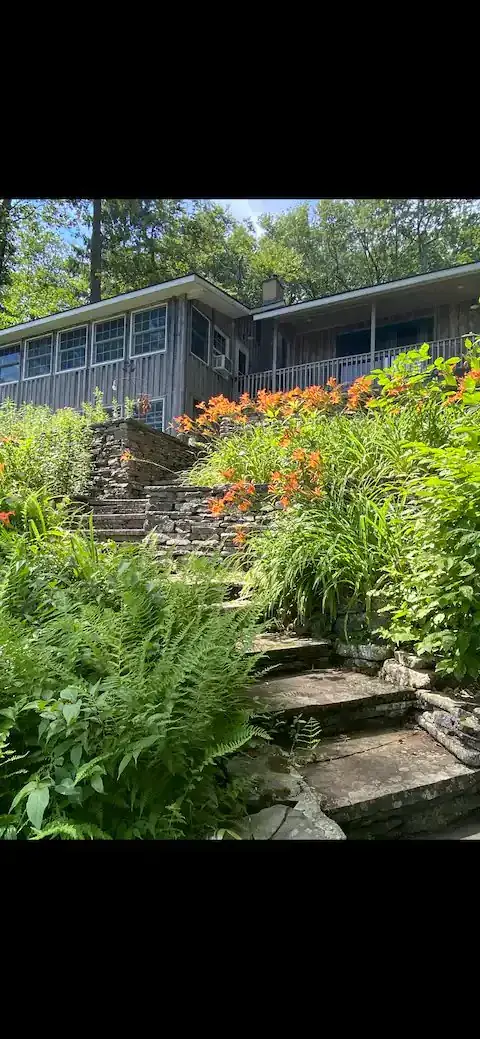 Shehawken Cabin exterior at golden hour
