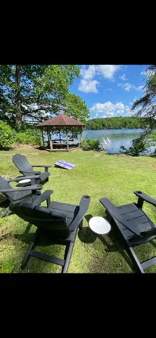 Lakeside gazebo with chairs