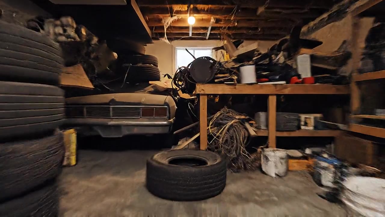 Cluttered garage before junk removal — Atlas catches the call